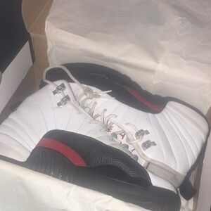 Men's White and Black Jordan 12 taxi flip